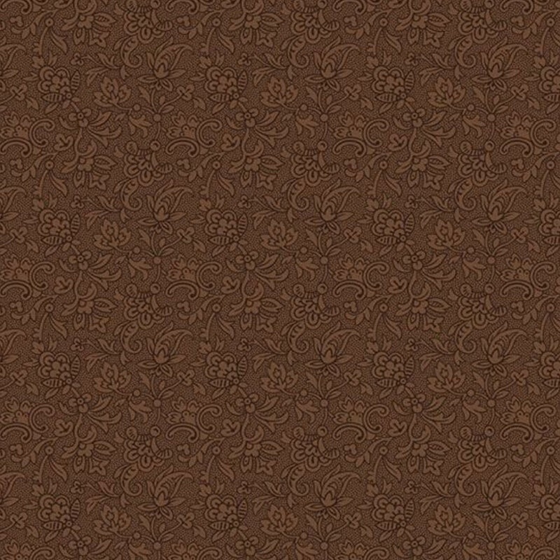 Tonal chocolate brown fabric with an intricate floral design