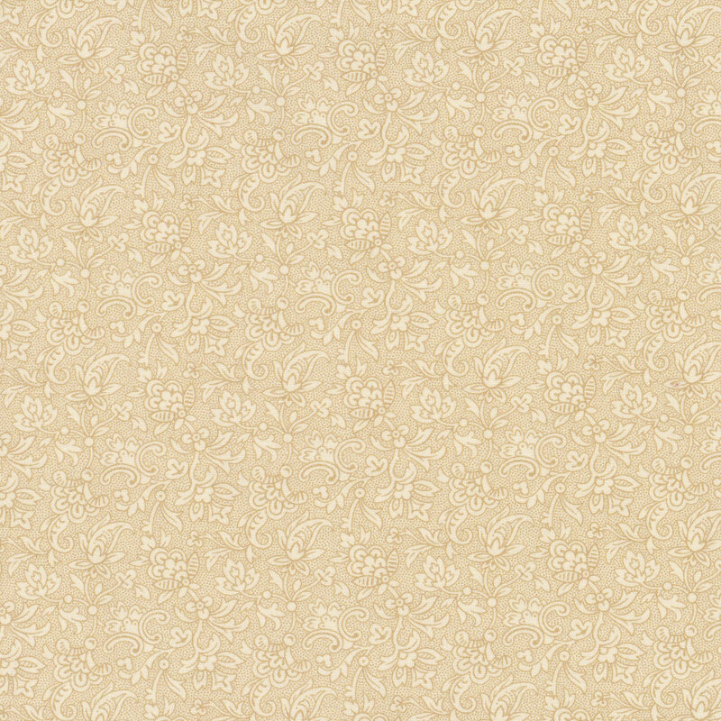 Tonal cream fabric with an intricate floral design