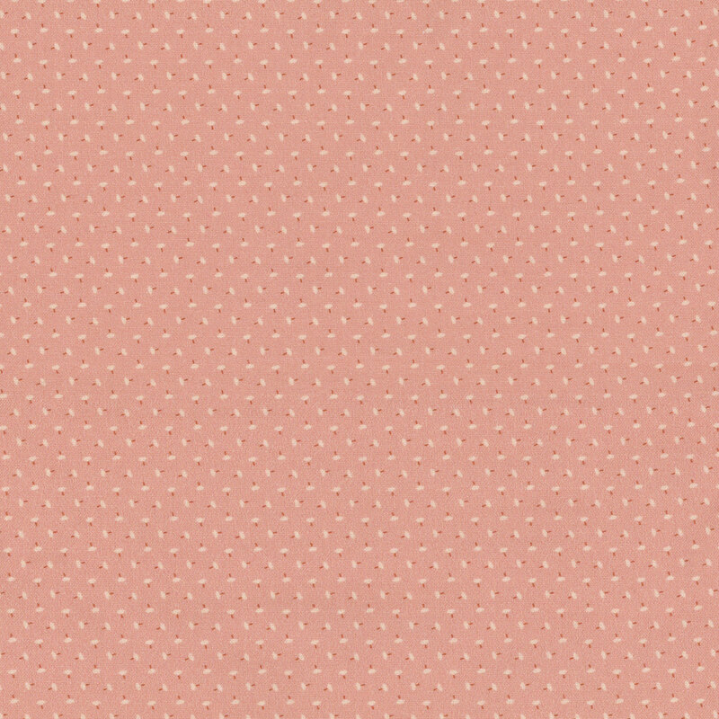 Soft pink fabric featuring a pattern of small tacks