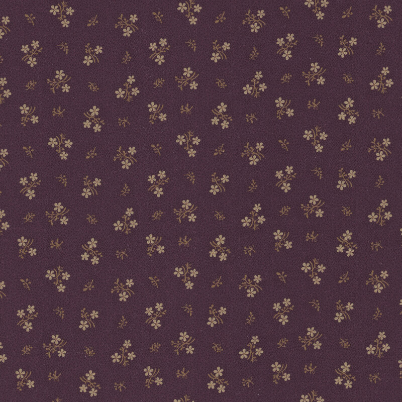 purple fabric with scattered small cream bouquets 