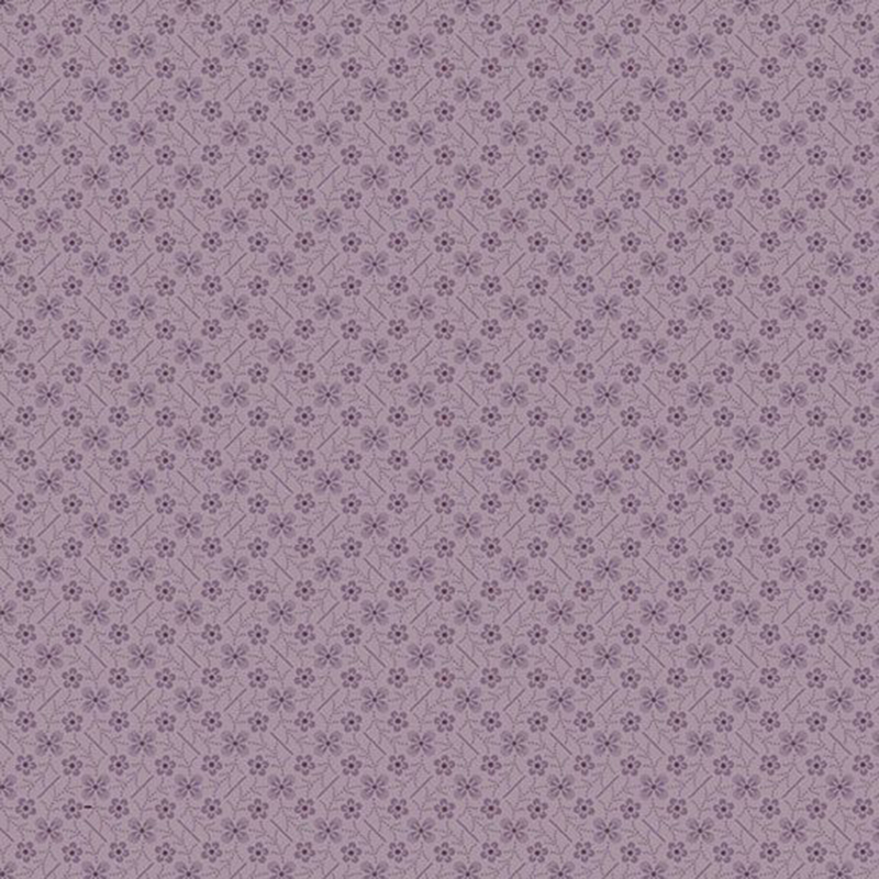 purple fabric with flowers and diagonal lines in a latticed zig-zag pattern