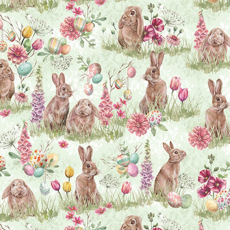 fabric featuring bunnies, flowers, and easter eggs amidst tall grass on a green background