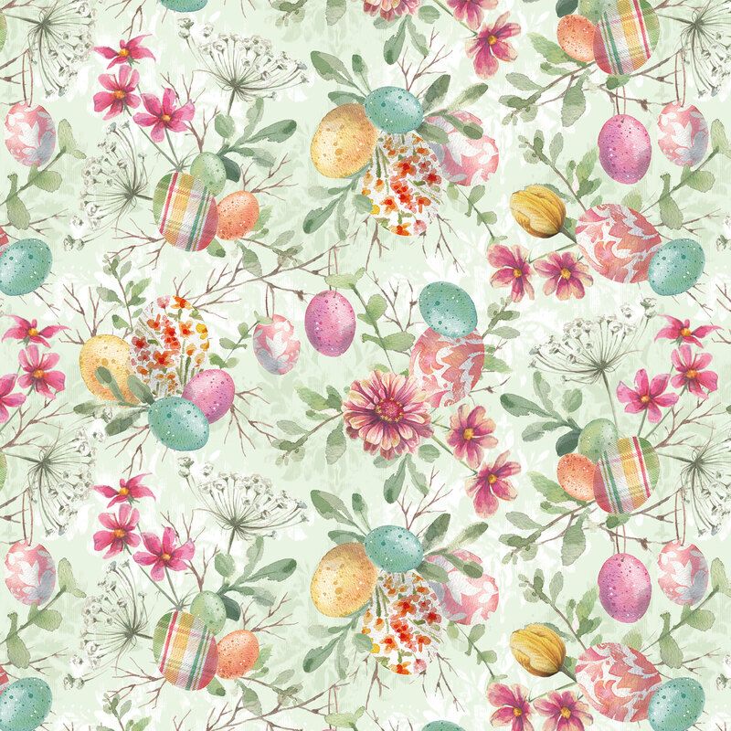light green fabric featuring easter eggs with leaves and flowers