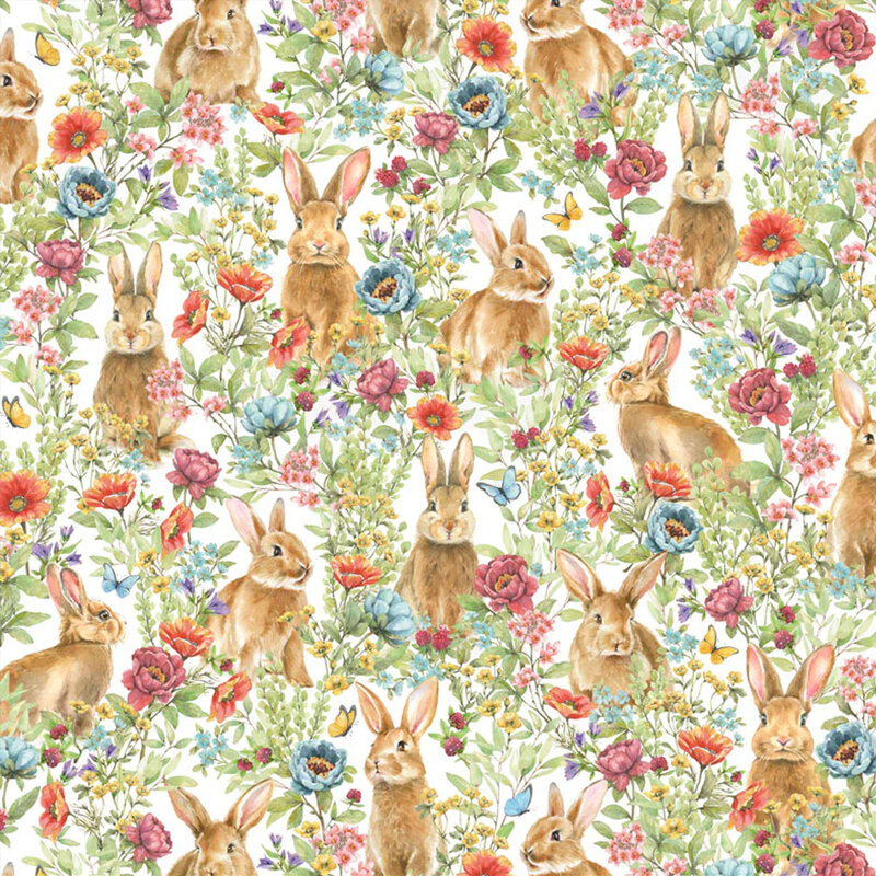 white fabric with bunnies surrounded by wildflowers and butterflies