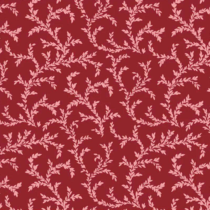 Red fabric featuring pink leafy vines