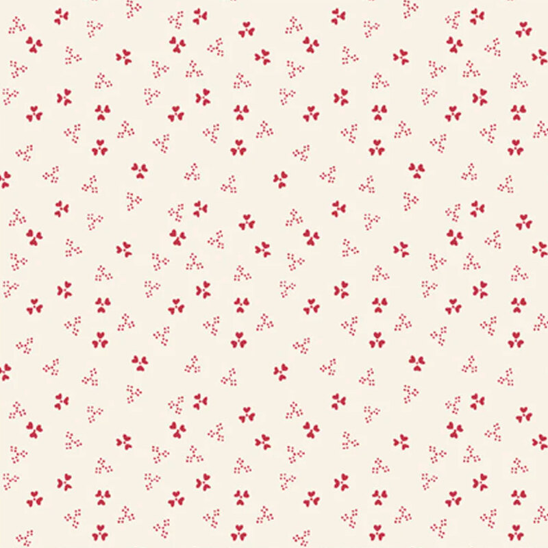 Cream fabric featuring small red florals 