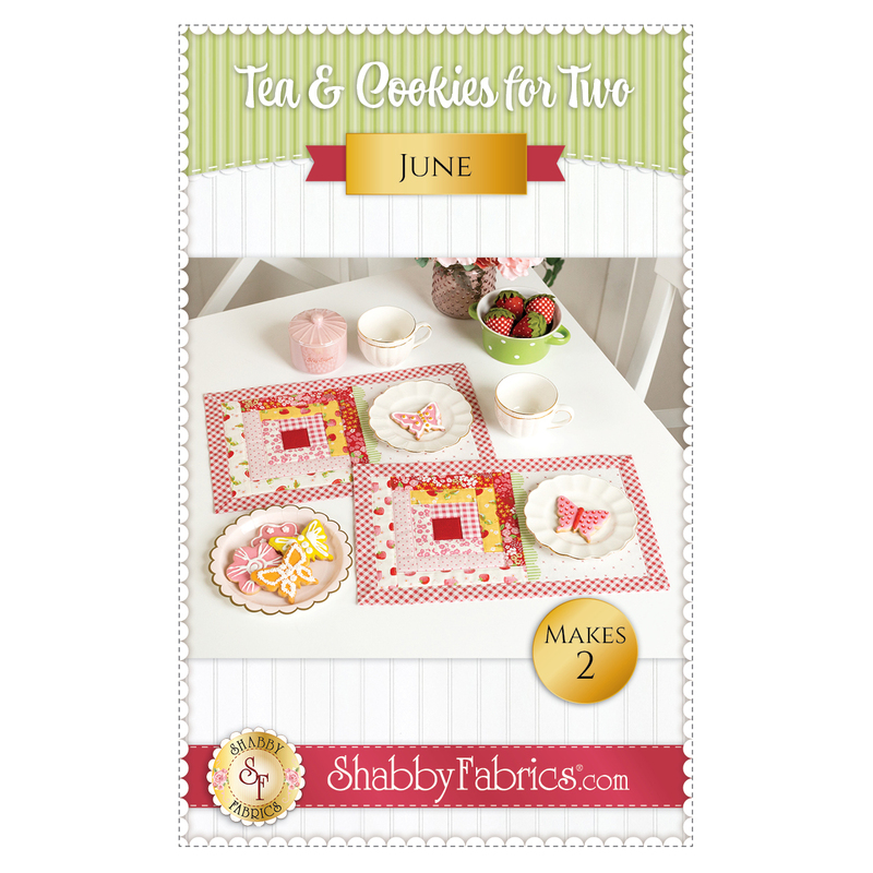 Front cover of the pattern featuring the two completed June mats in bright pink, red, and yellow, staged on a white table with beautifully frosted coordinating butterfly cookies.