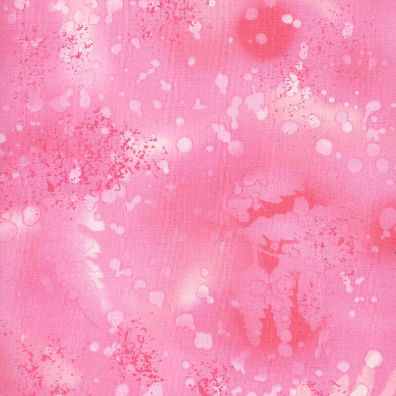 variegated pink fabric with light splatters and mottling
