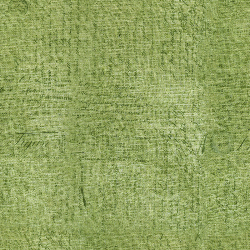 green fabric with perpendicular blocks of small cursive lettering