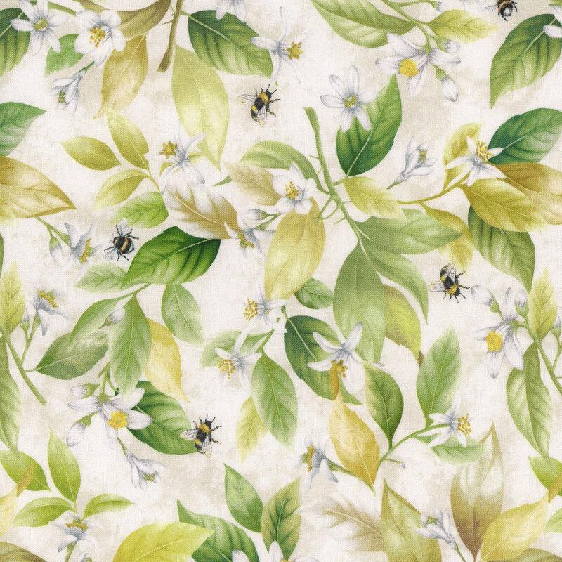 cream fabric with bees flying between lemon flowers on lemon tree