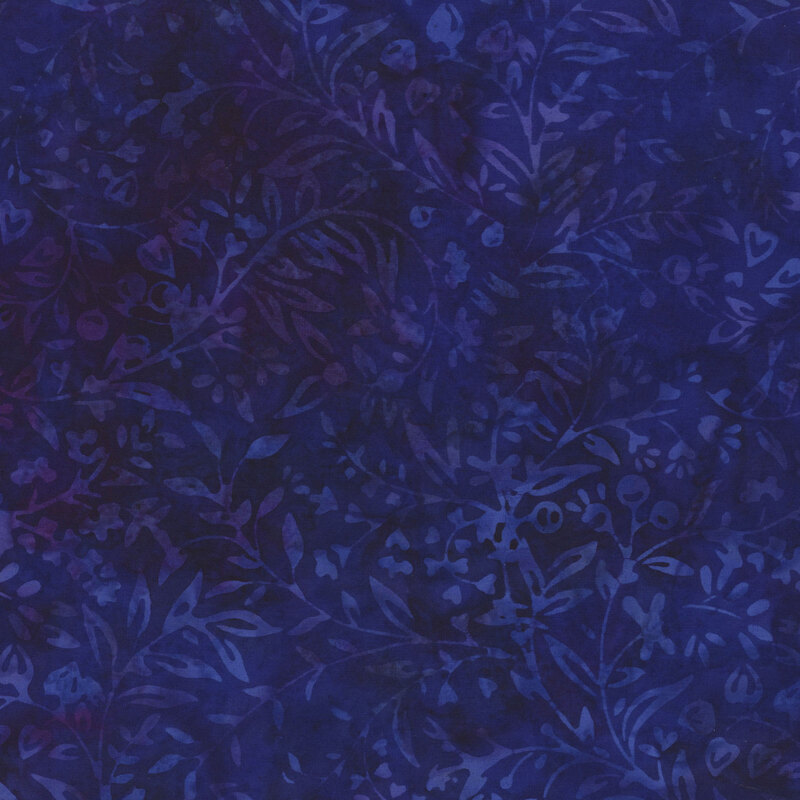 Dark purple mottled batik fabric with faint hints of floral outlines throughout