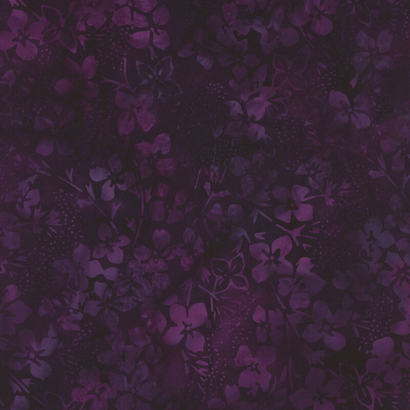 Deep purple fabric that is almost black with mottling and faint hints of purple florals throughout