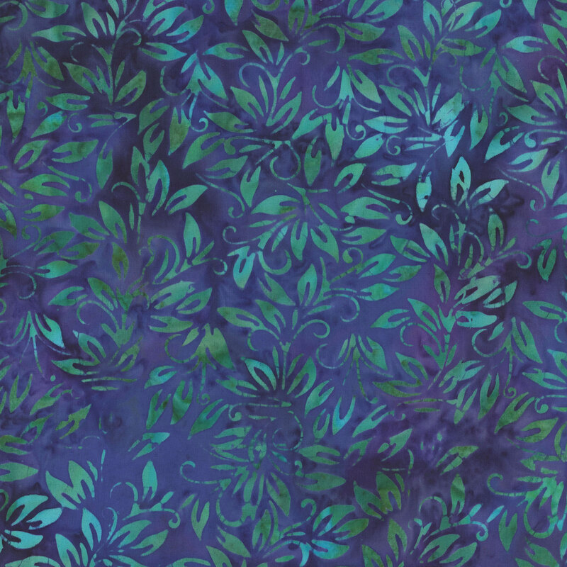 Mottled purple fabric with green leaves throughout