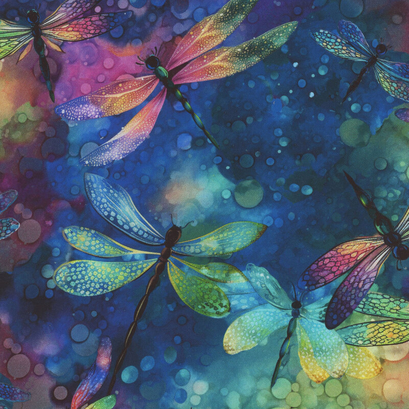 Colorful dragonflies in shades of blue, green, and purple, against a vibrant, watercolor background.