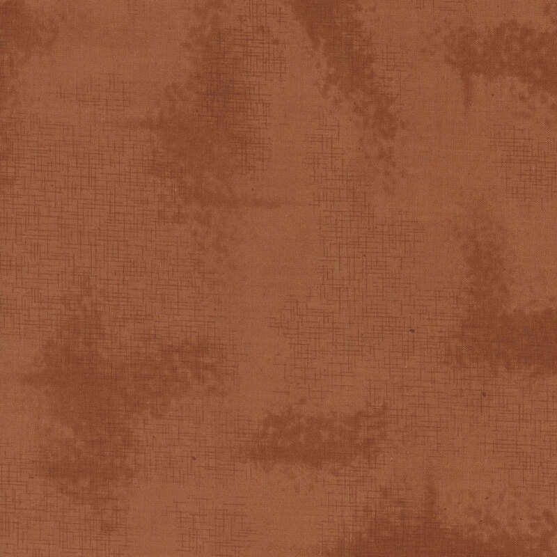 A basic warm brown fabric with crosshatching and mottling
