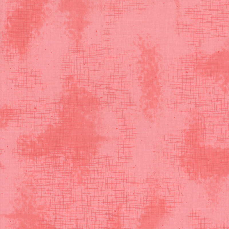 A basic coral pink fabric with crosshatching and mottling
