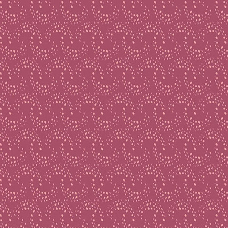 rouge fabric with overlapping rows of light pink arcing dots 