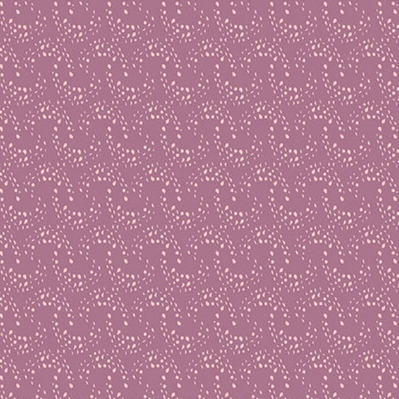 purple fabric with overlapping rows of light pink arcing dots 