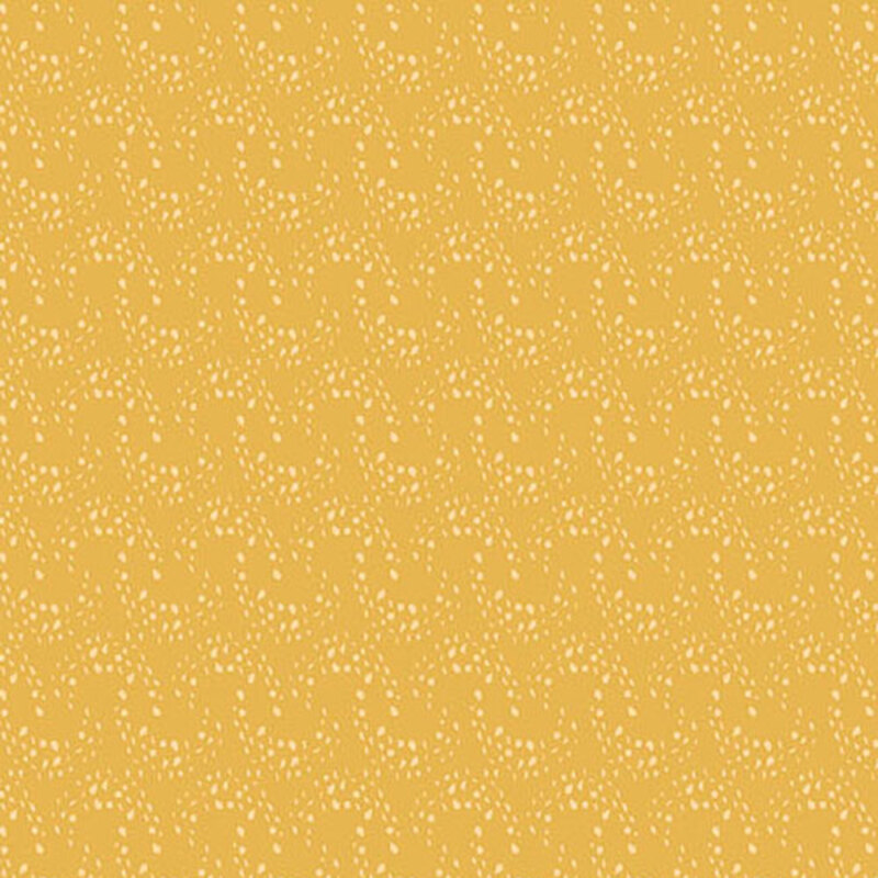 yellow fabric with overlapping rows of light yellow arcing dots 