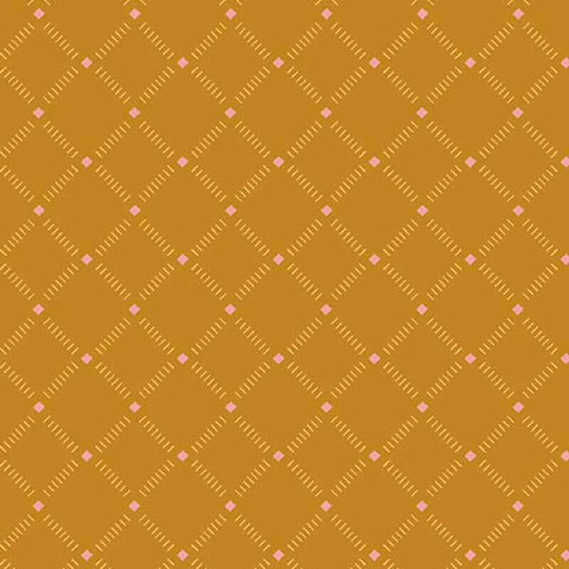 golden yellow fabric with small diagonal lines in a light yellow lattice pattern and pink diamonds where the lines intersect