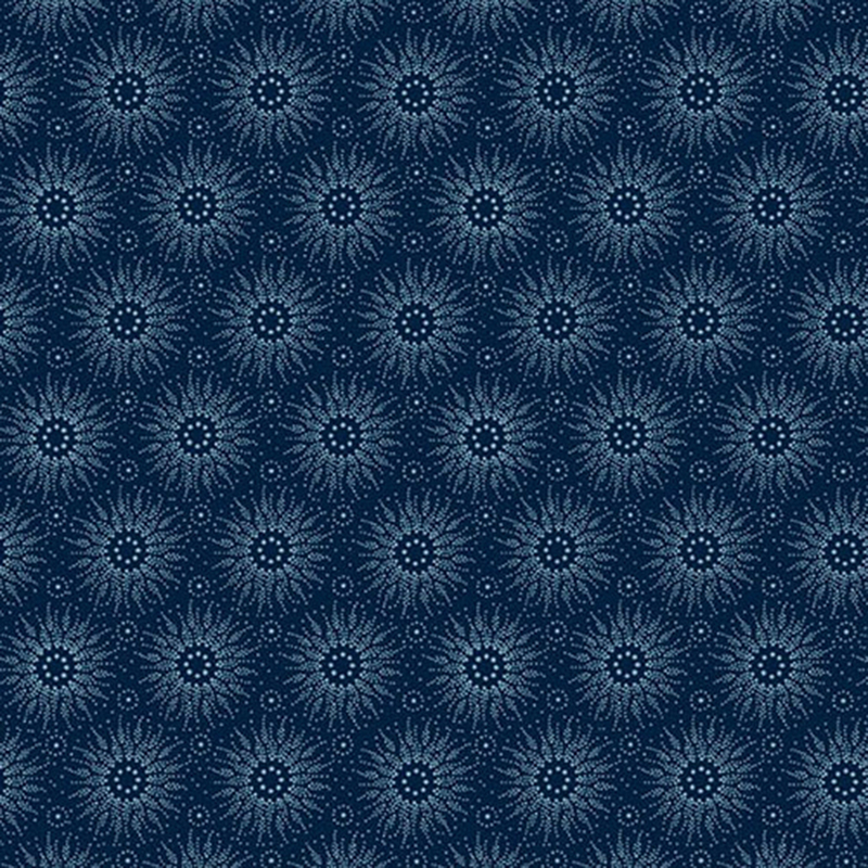 Blue fabric featuring a sun design made with many dots