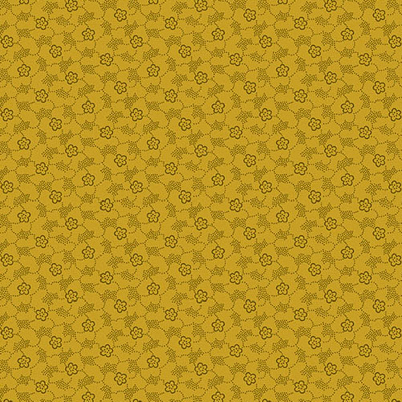 Mustard yellow tonal fabric featuring a textured pattern of tiny dots and flowers