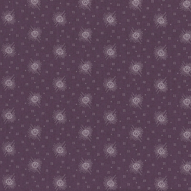 Mauve fabric featuring flowers surrounded by dots