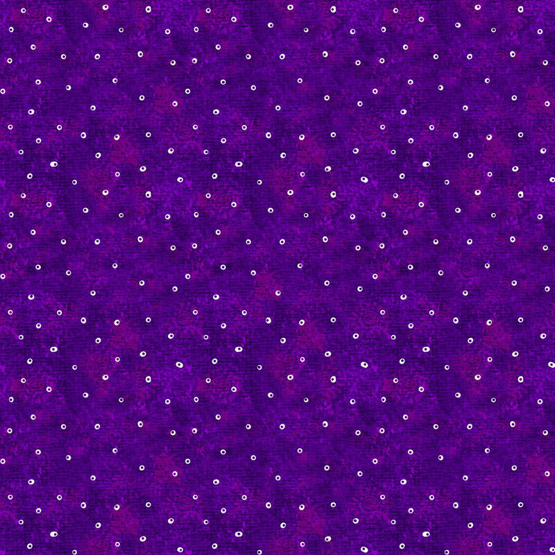 Purple mottled fabric with small white rings all over