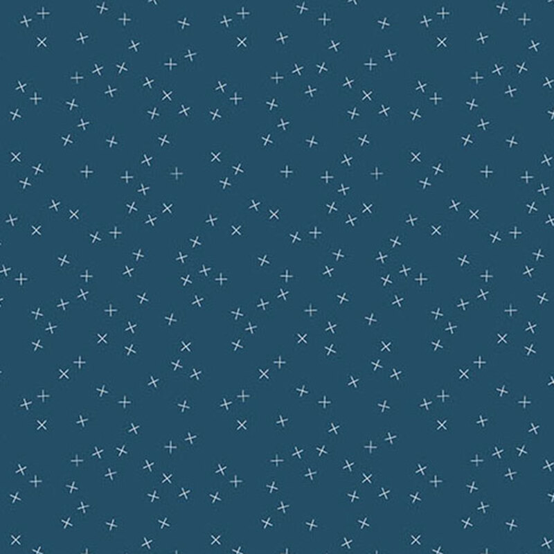 Medium teal navy blue fabric with small white X's scattered throughout
