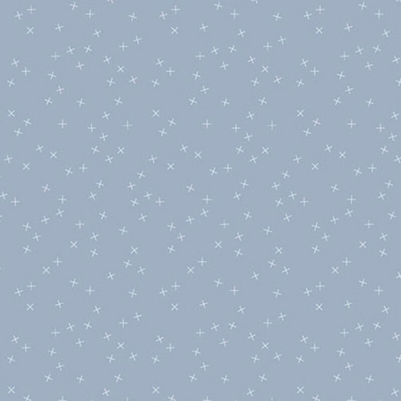 Light blue fabric with small white X's scattered throughout