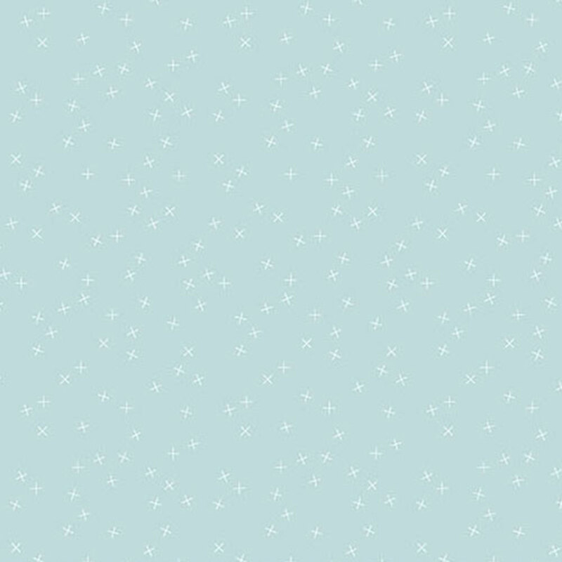 Light aqua fabric with small white X's scattered throughout