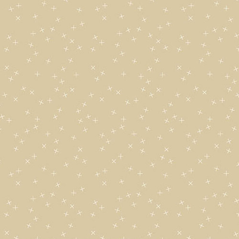 Medium taupe fabric with small white X's scattered throughout