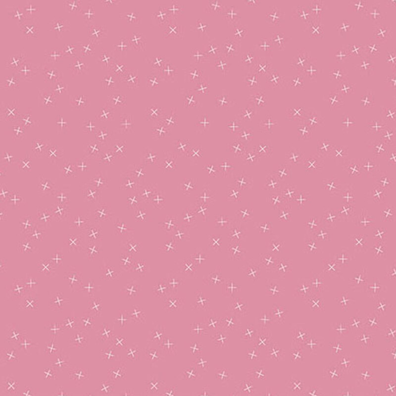Small pink fabric with small white X's scattered throughout