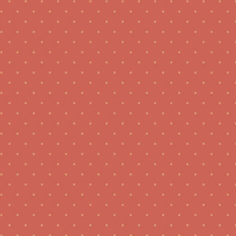 Brick red fabric with repeating small, burnt orange blocks throughout