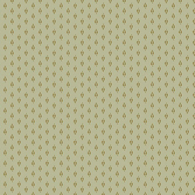 Light teal fabric with small, brown repeating shapes throughout
