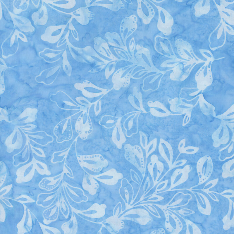 Sky-blue batik fabric with long white leafy vines.