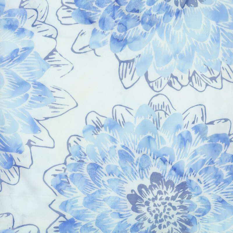 White batik fabric with cool blue undertones with large blue watercolor dahlia flowers.
