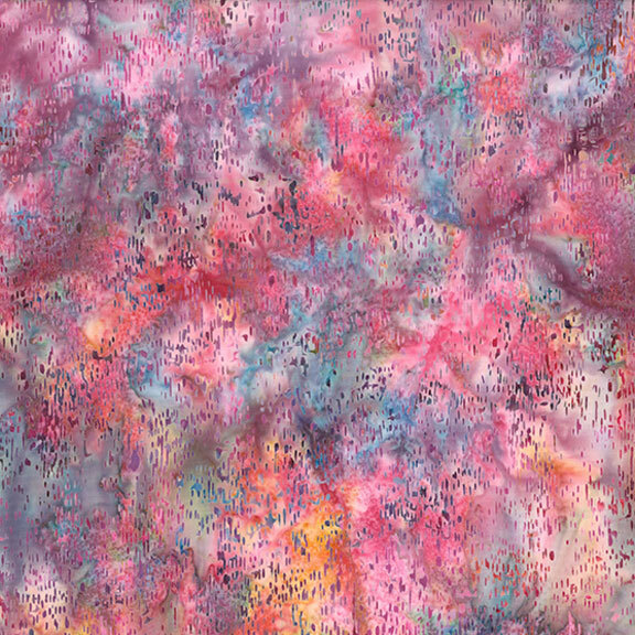 Batik fabric with small textured splotches and a multi-colored mottled background