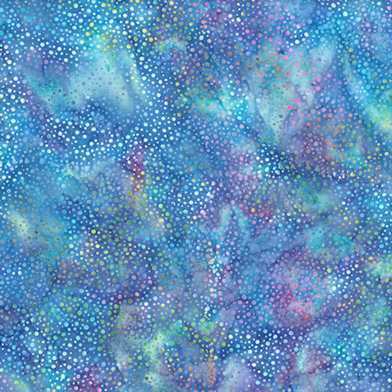 Medium blue batik fabric with purple and aqua mottling throughout and small colorful spots all over