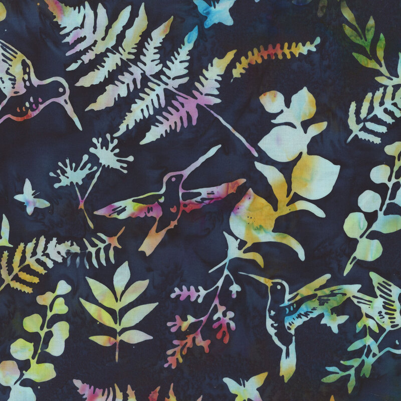 Dark navy blue mottled batik fabric with outlines of multi-colored hummingbirds and leafy sprigs.