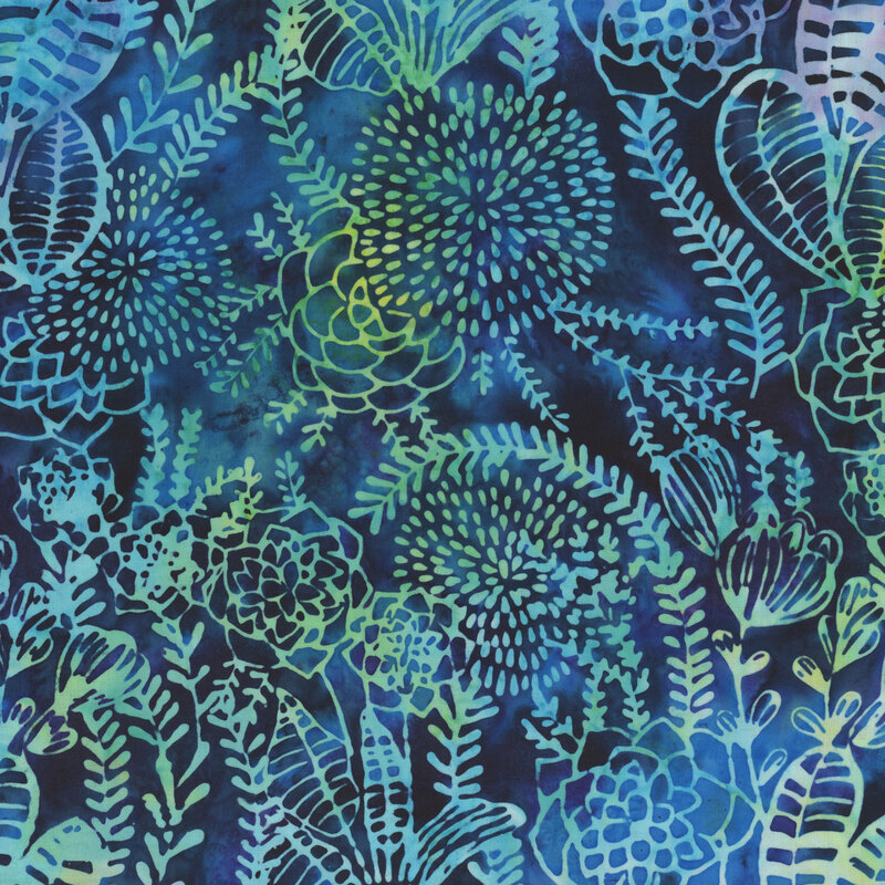 Dark navy bue mottled batik with large outlines of multi-colored leaves, flowers, and vines all over.