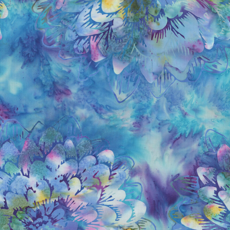 Medium blue mottled batik fabric with large, multi-colored circular florals throughout.