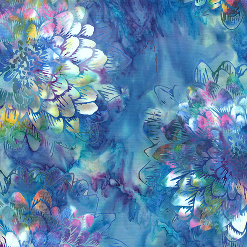 Medium blue mottled batik fabric with large, multi-colored circular florals throughout