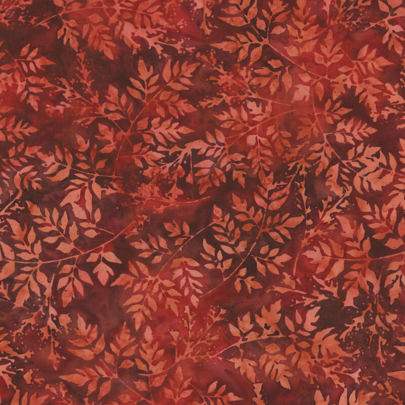 Red batik with tonal leaf pattern.