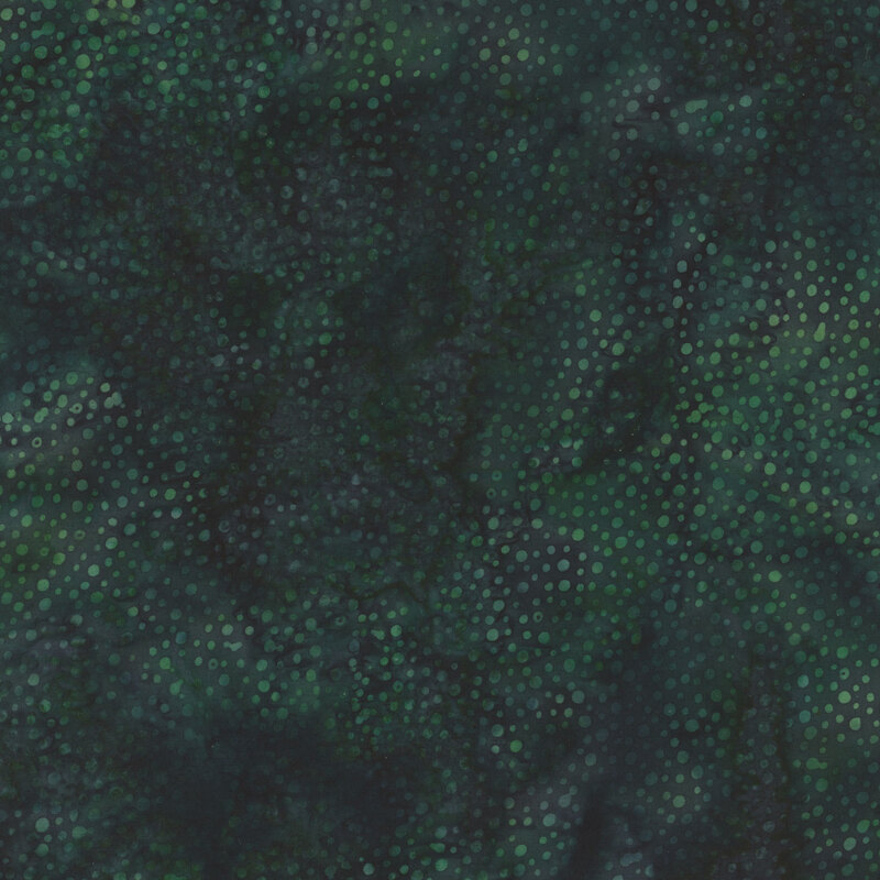 Tonal teal fabric with scattered dots.