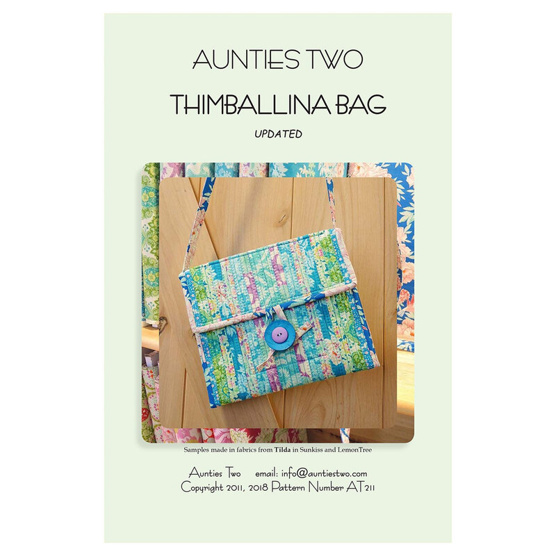 Front Cover of Thimballina Bag by Aunties Two Patterns featuring the finished bag displayed in front of wood planks