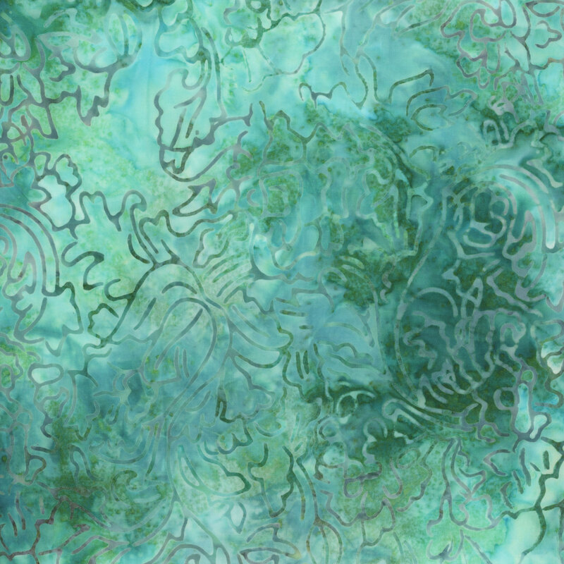 mottled turquoise batik fabric with abstract foliage
