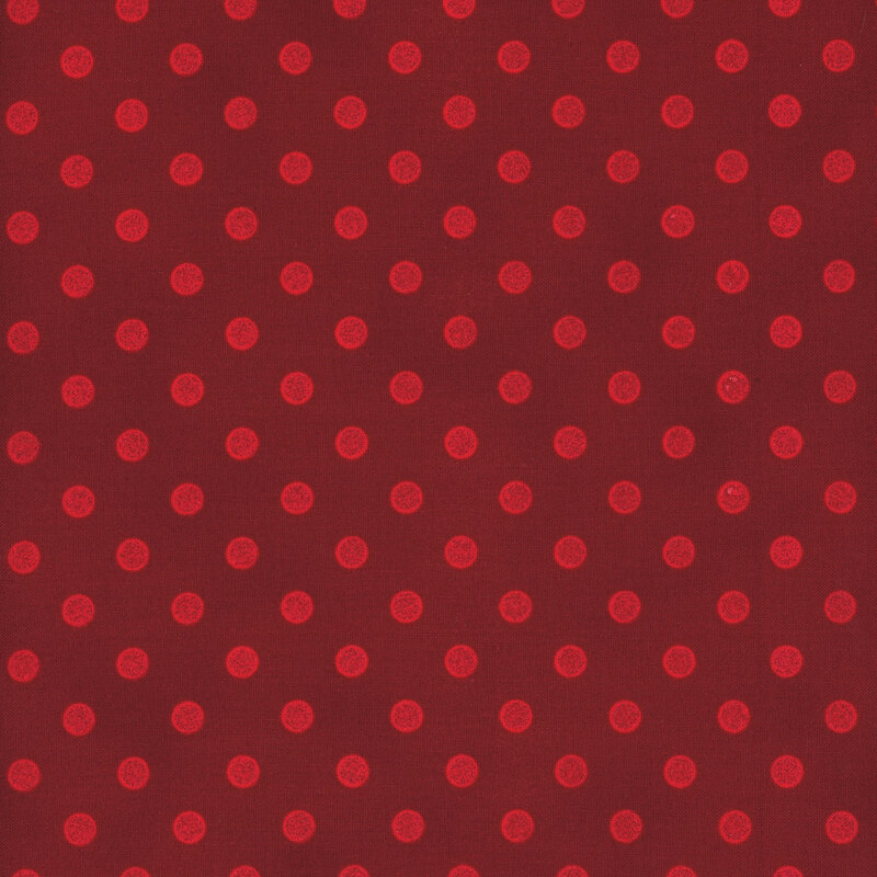 crimson fabric with metallic polka dots
