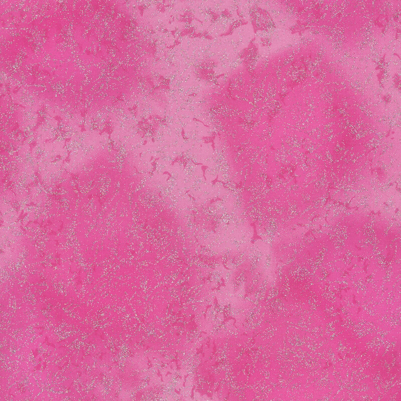 Bright pink fabric featuring a mottled design with metallic glitter accents