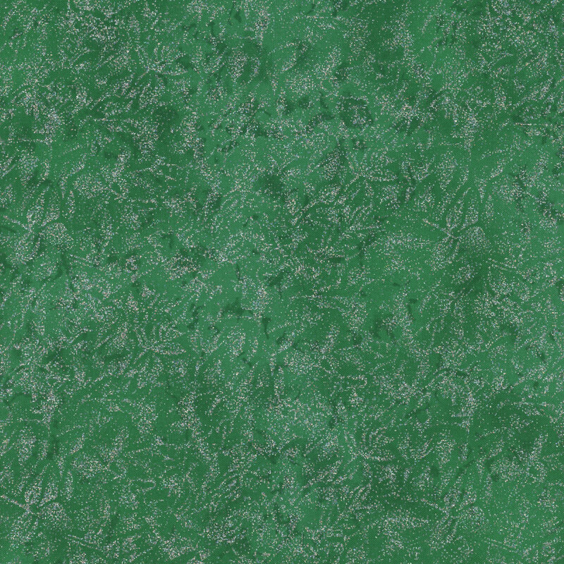 Green colored fabric featuring a mottled design with metallic glitter accents.
